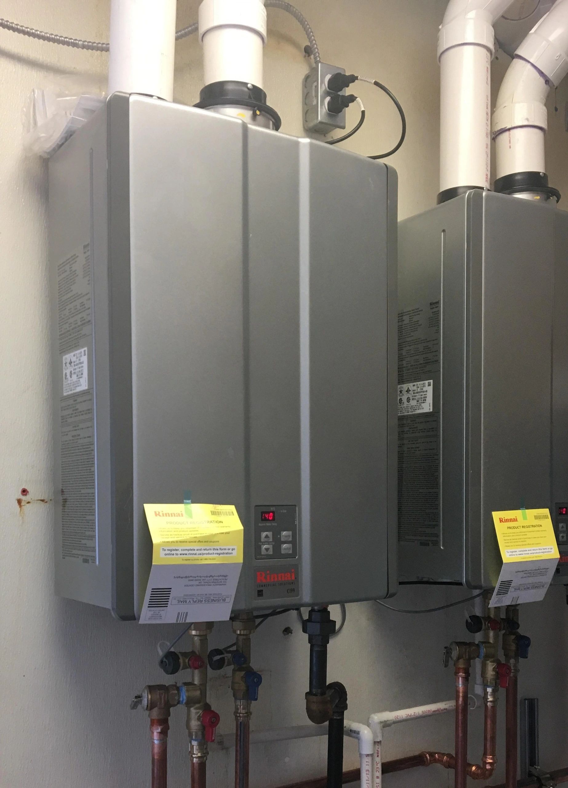 Two Rinnai tankless water heaters professionally installed by Sloan Plumbing