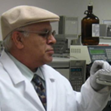 A man wearing a lab coat