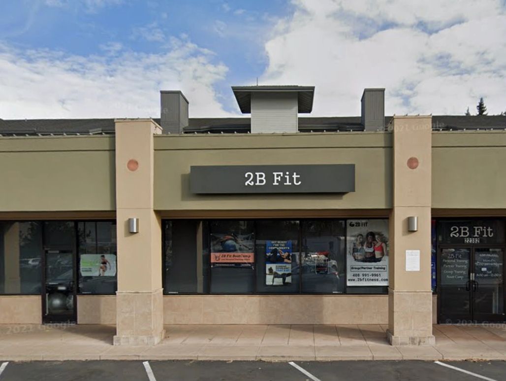 Picture of the gym from the outside, a building with a sign that reads "2B Fit" on it