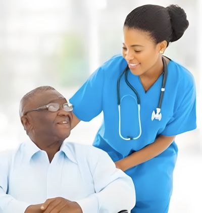 A young African American female healthcare provider in blue scrubs with a stethoscope