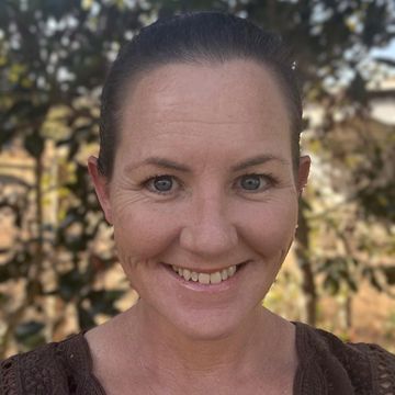 Professional headshot of Rebecca.