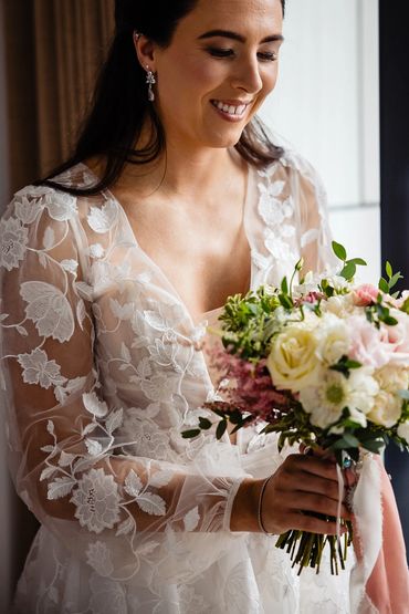 Pretty blush and ivory bridal bouquet with Dahlias, Nigella and Astilbe flowers at Palm House