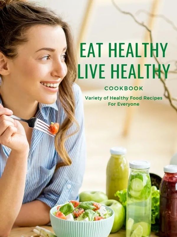 Woman enjoying a healthy meal with fresh salad and juices.