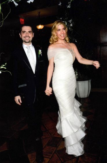 wedding dress fashioned using netting and jeweled applique from another dress