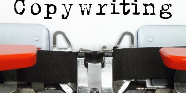 Close-up of a typewriter with the word 'Copywriting' typed.