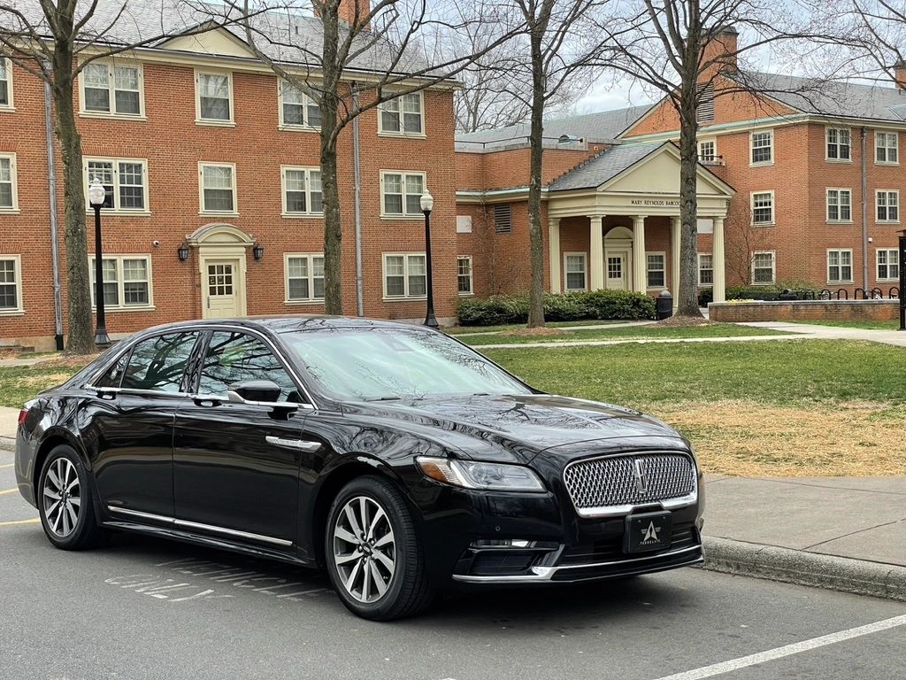 black car parked in front Luter hall atwake forest university waiting to go to the airport in CLT