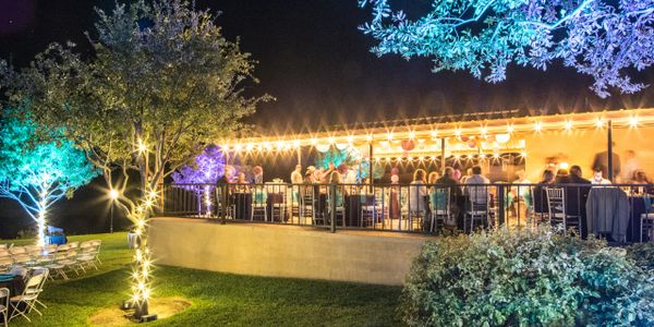Wedding reception & dinner on the patio at Cain's Cove on Lake Nasworthy in San Angelo Texas