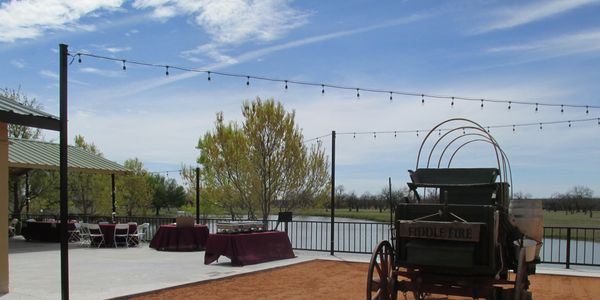 Fiddle Fire Catering in the courtyard at Cain's Cove Wedding Venue on Lake Nasworthy in San Angelo