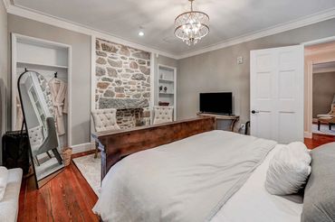 Luxury-hotel-quality bedroom suites include televisions and personalized robes for your use.