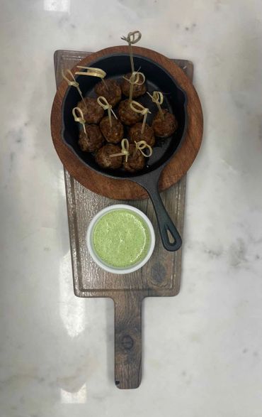 Spice up the cocktail party with passed appetizers including lamb meatballs