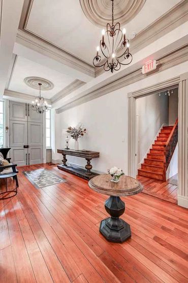 The restored gathering hall is perfect feature for your cocktail party and gathering event.