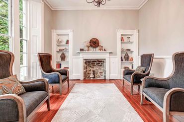 Take your cocktail, coffee, or desert in our main-level library.