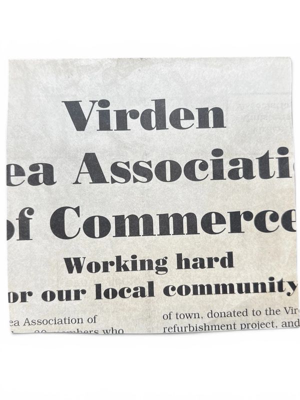 Newspaper clipping about Virden Area Association of Commerce working hard.