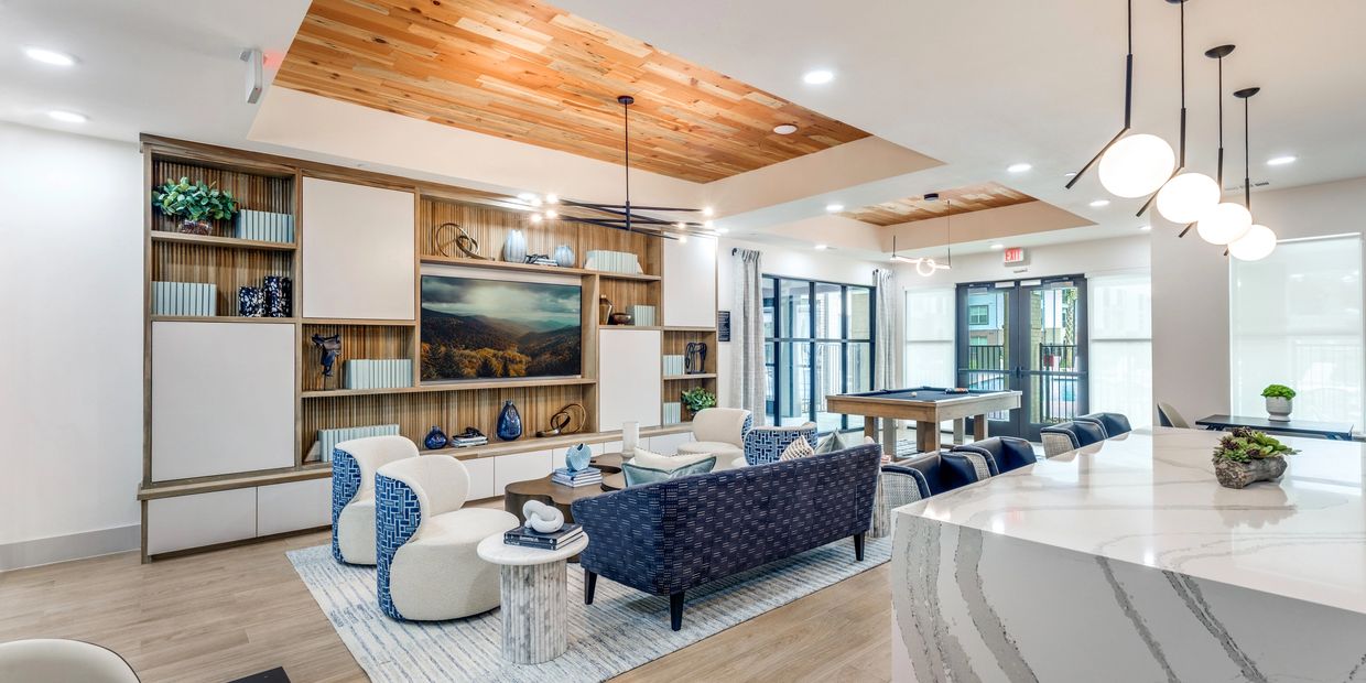 clubhouse with sitting area and television