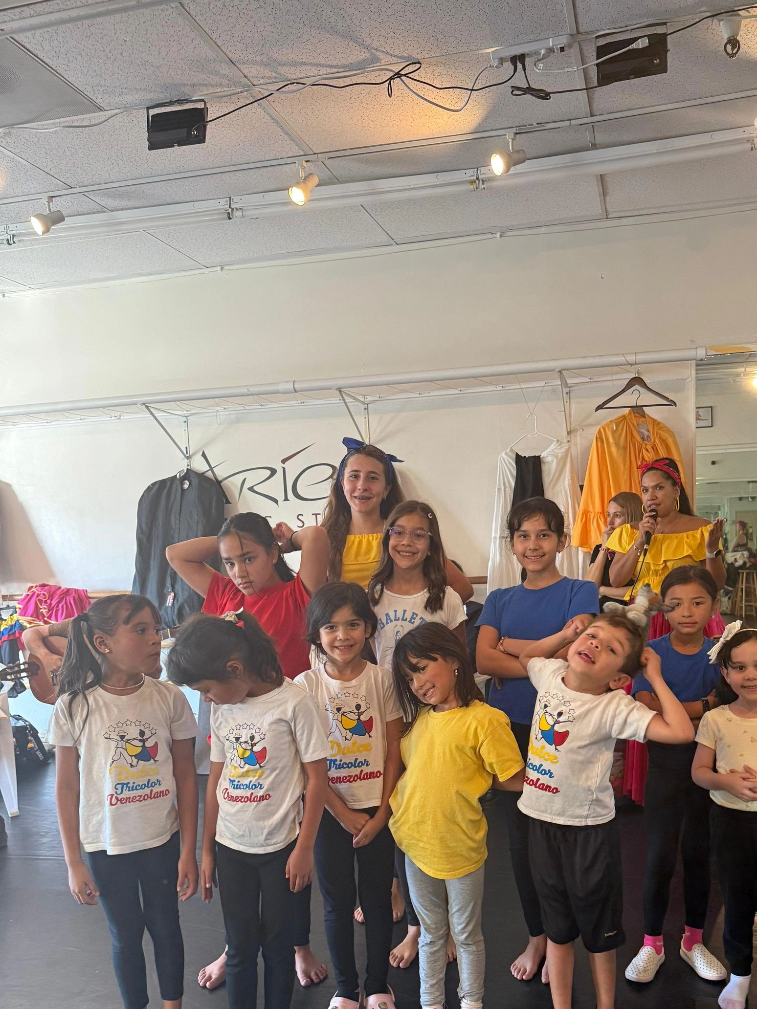 Venezuelan folk dance students learning traditional dance moves at Dulce Tricolor class in Campbell