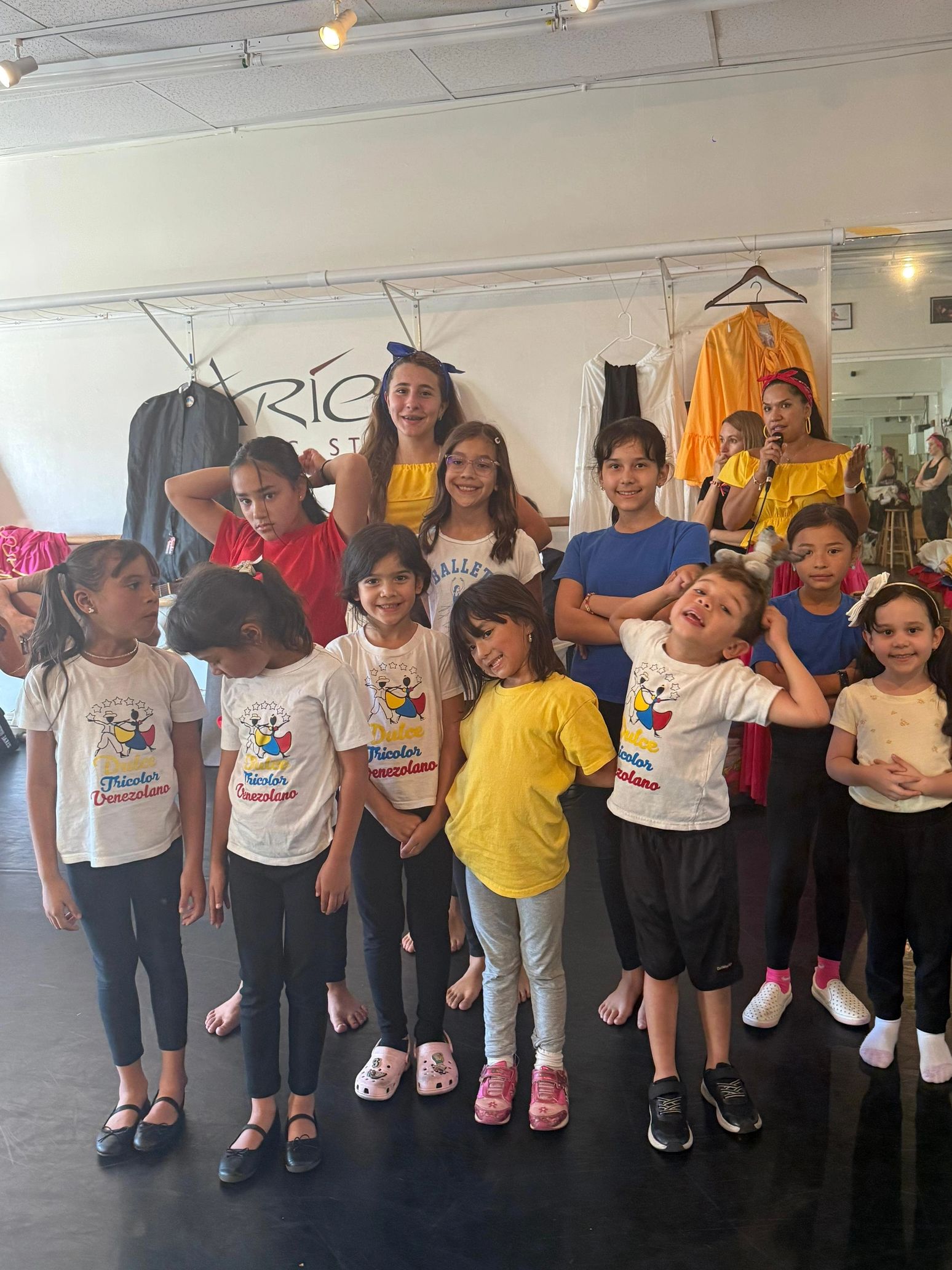 Venezuelan folk dance students learning traditional dance moves at Dulce Tricolor class in Campbell
