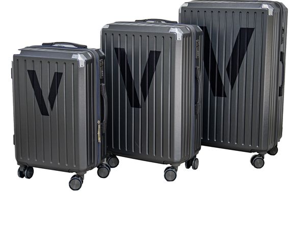 Three black hard-shell suitcases of different sizes.