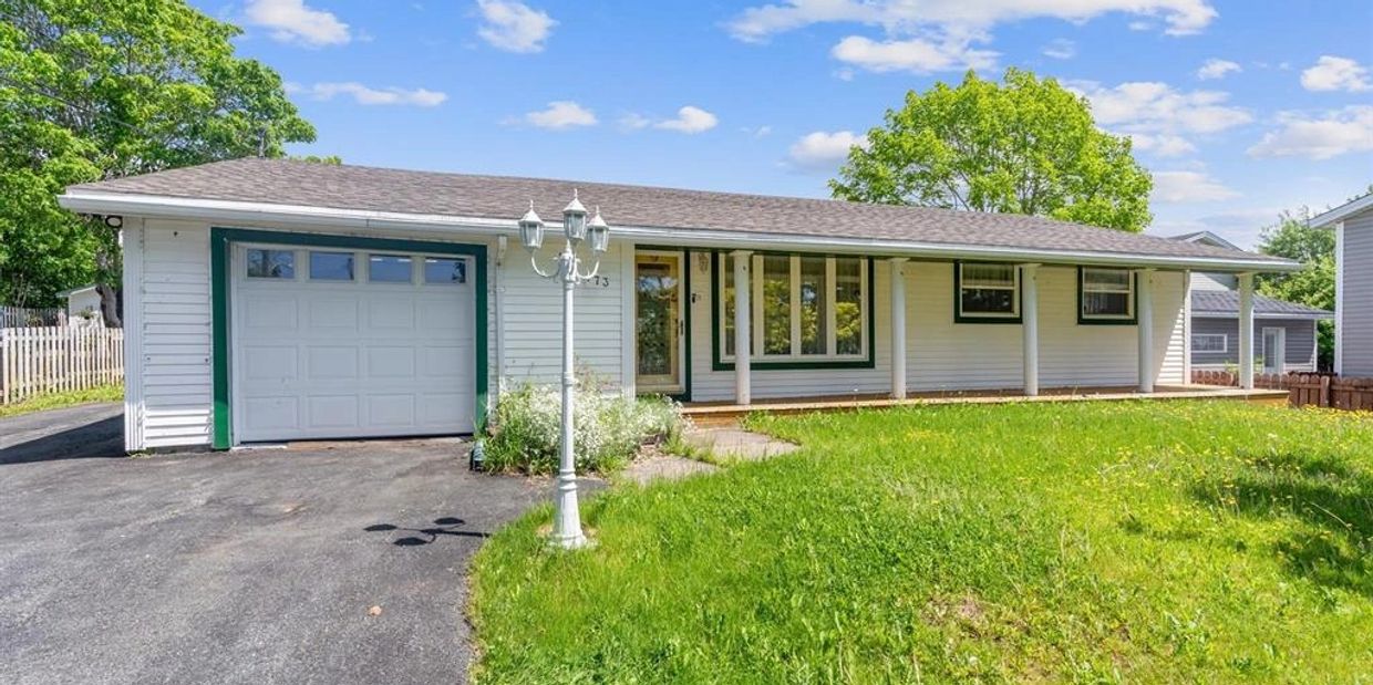 Exterior of a family home with a garage on Bay Bulls Road, St. John's.