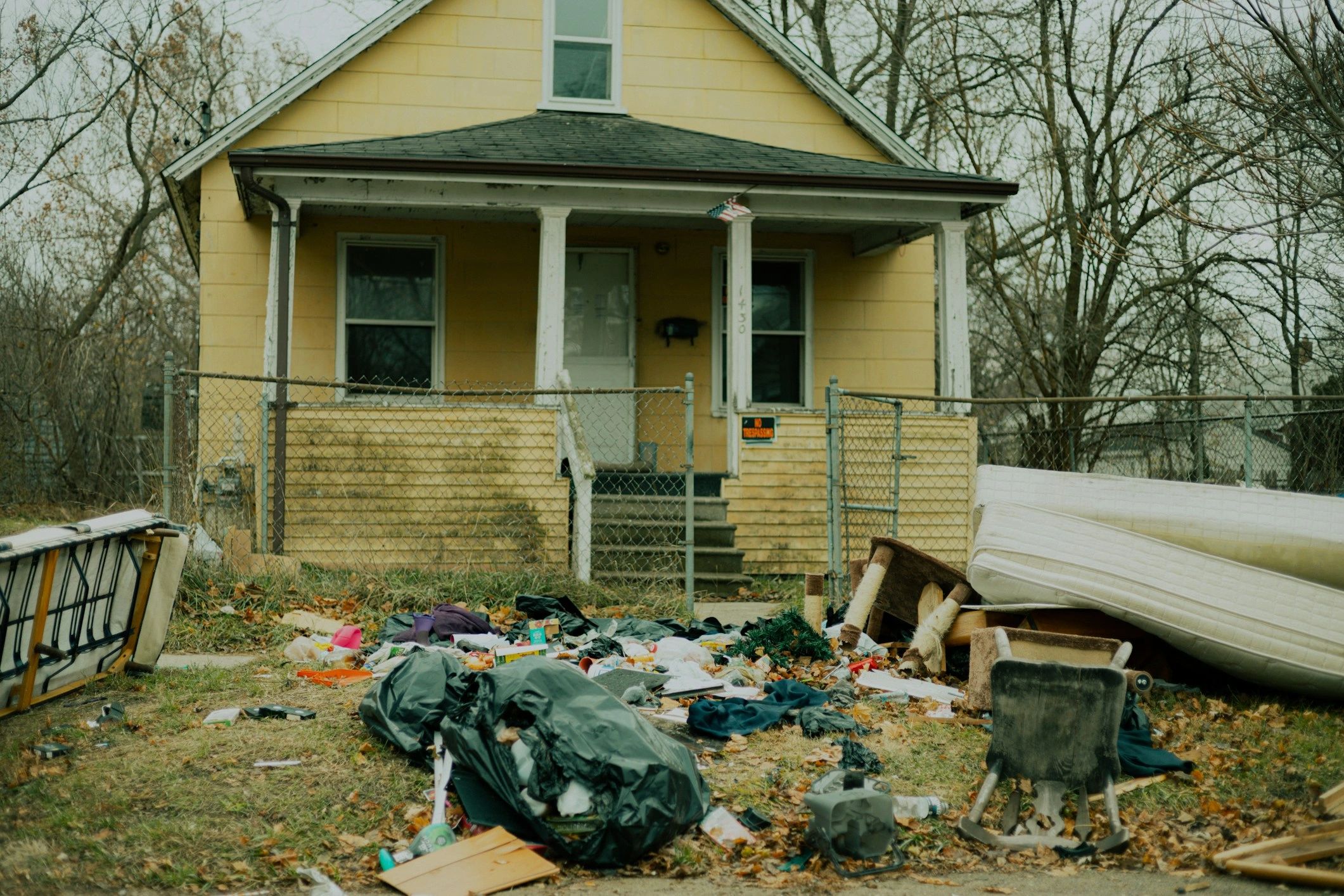 A home cleared of clutter and a crew loading a truck in Muncie, Indiana.