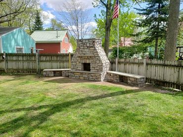Custom Outdoor Fireplace made with Fondulac Stone. Sills made out of Indiana Limestone