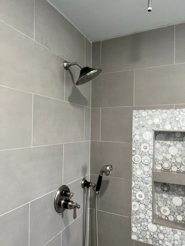 New tile shower with Brizo faucet and handheld shower with rain can