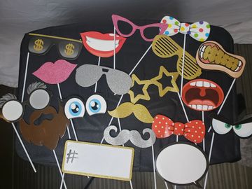 Bow ties, lip, mouth, grill teeth, smile, glasses, eyes & mustaches. Sparkly gold & silver on stick