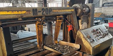 Horizontal band saw cutting for cutting stock lengths of structural steel bundles to specific length
