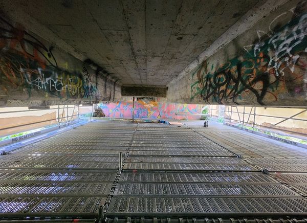Scaffolding under a road bridge in Whangarei Avenues for WDC concrete repairs, April 2026