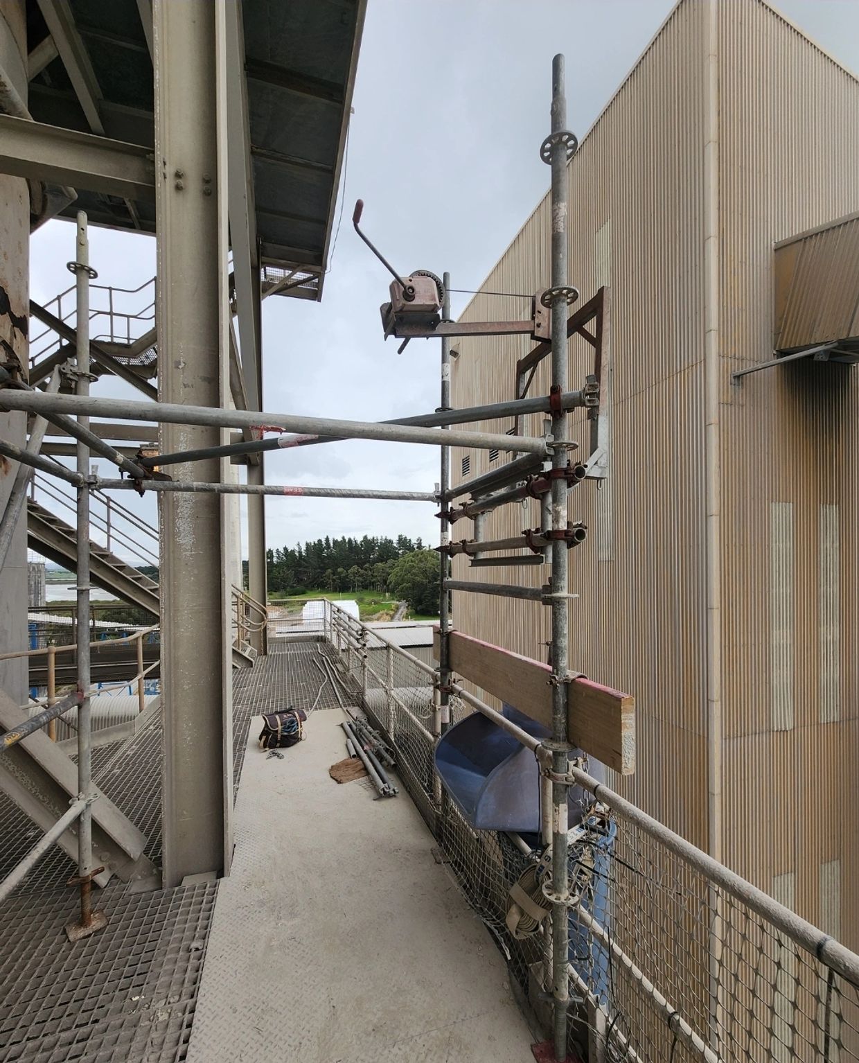 Construction waste chutes setup in Portland using a winch for shutdown work at golden bay cement