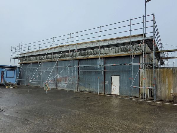 Scaffolding for roof repairs around an old airport hanger in Dargaville, Northland.