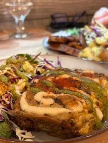 Lasaña vegana chorrea—pasión arde