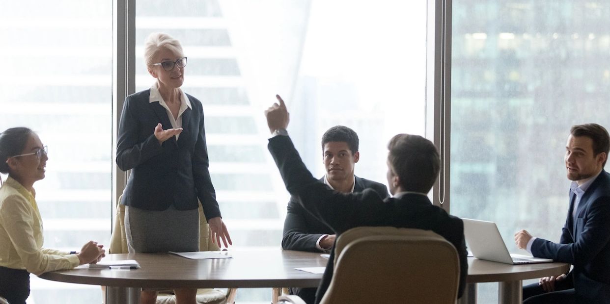 Around the table strategy session with diversity of thought being used for better decisions.