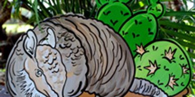 Illustrated armadillo among cacti.