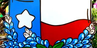Texas flag painting with bluebonnets and greenery.