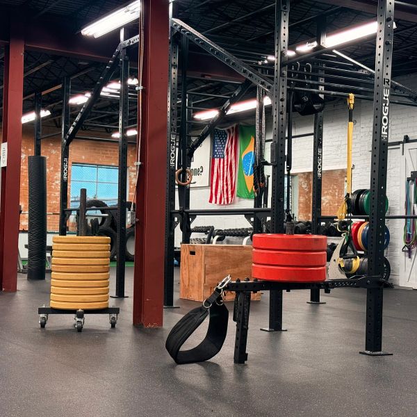 Gym with weight plates and flags.