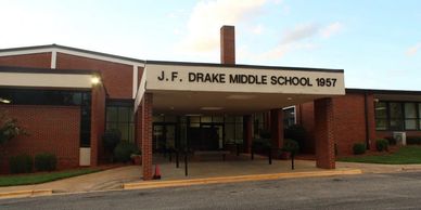Drake Middle School serves 6th grade. Drake Building Front Exterior