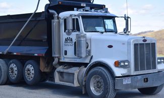 M&M Feed and Supply has dump trucks that deliver stone lime slag and ag products. 