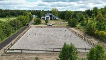 95x160 horse arena with sub graded cut in and tile installed! High jumps around here!