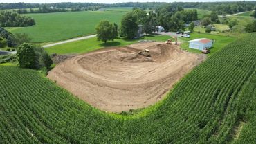 Working on a 3/4 acre pond. Really taking shape after day 3!