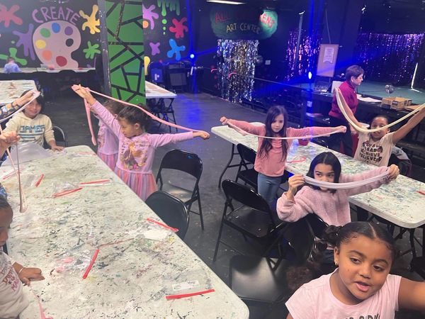 Children exploring creativity through art activities