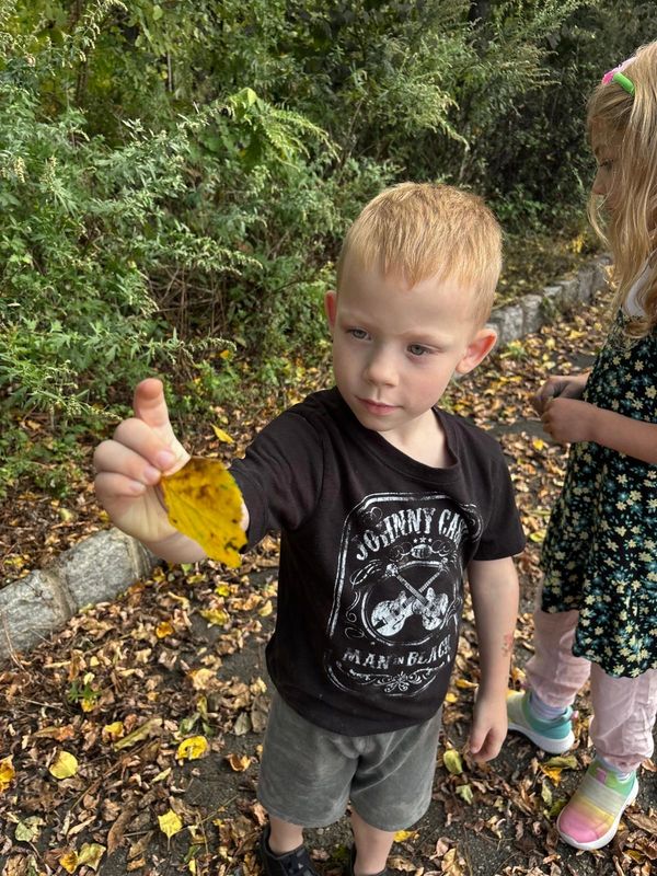 Children exploring their imaginations through painting and drawing