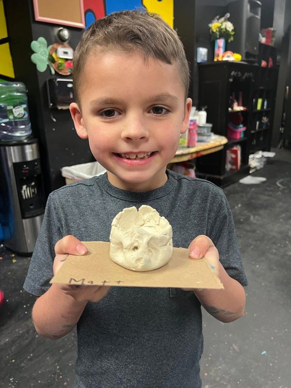 All Children's Art Center Happy kids creating masterpieces during their art lesson