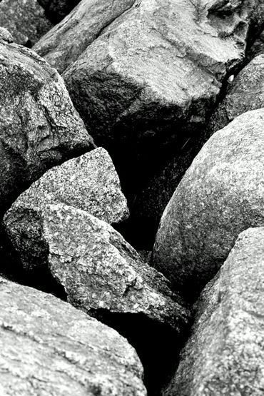 Christopher LeClaire Photography. Cape Cod jetty. Black and white photo of rocks. Bolders. Jetty. 