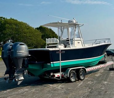 Professionally detailed fishing boat on trailer after marine detailing service in Cape Cod, MA