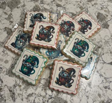 Christmas-themed cookies decorated with gnome and hot chocolate designs individually wrapped.