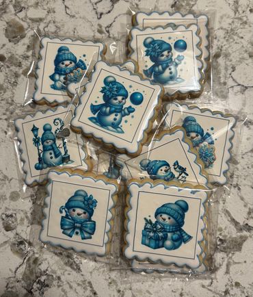 Packaged winter-themed cookies with blue snowman designs.