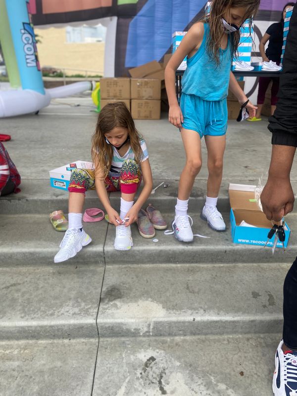 Kaliyah Wheeler  2nd Annual 500 pair shoe give away W/ T-rell Topeka KS (year 2001)