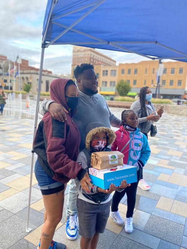 Kaliyah Wheeler  1st Annual 300 pair shoe give away W/ T-rell Topeka KS (year 2000)