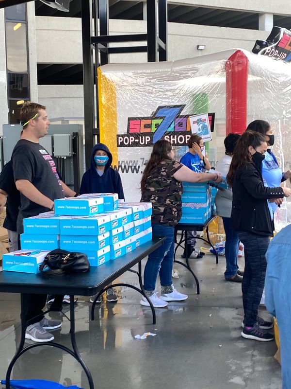 7scooops CEO Kaliyah Wheeler  1st Annual 300 pair shoe give away W/ T-rell Topeka KS (year 2000)