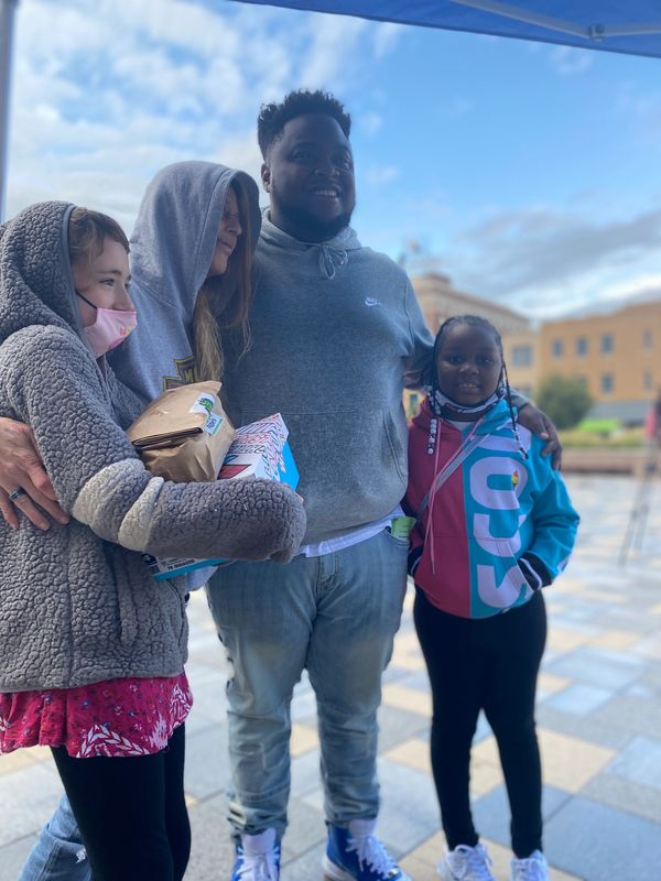 Kaliyah Wheeler  1st Annual 300 pair shoe give away W/ T-rell Topeka KS (year 2000)